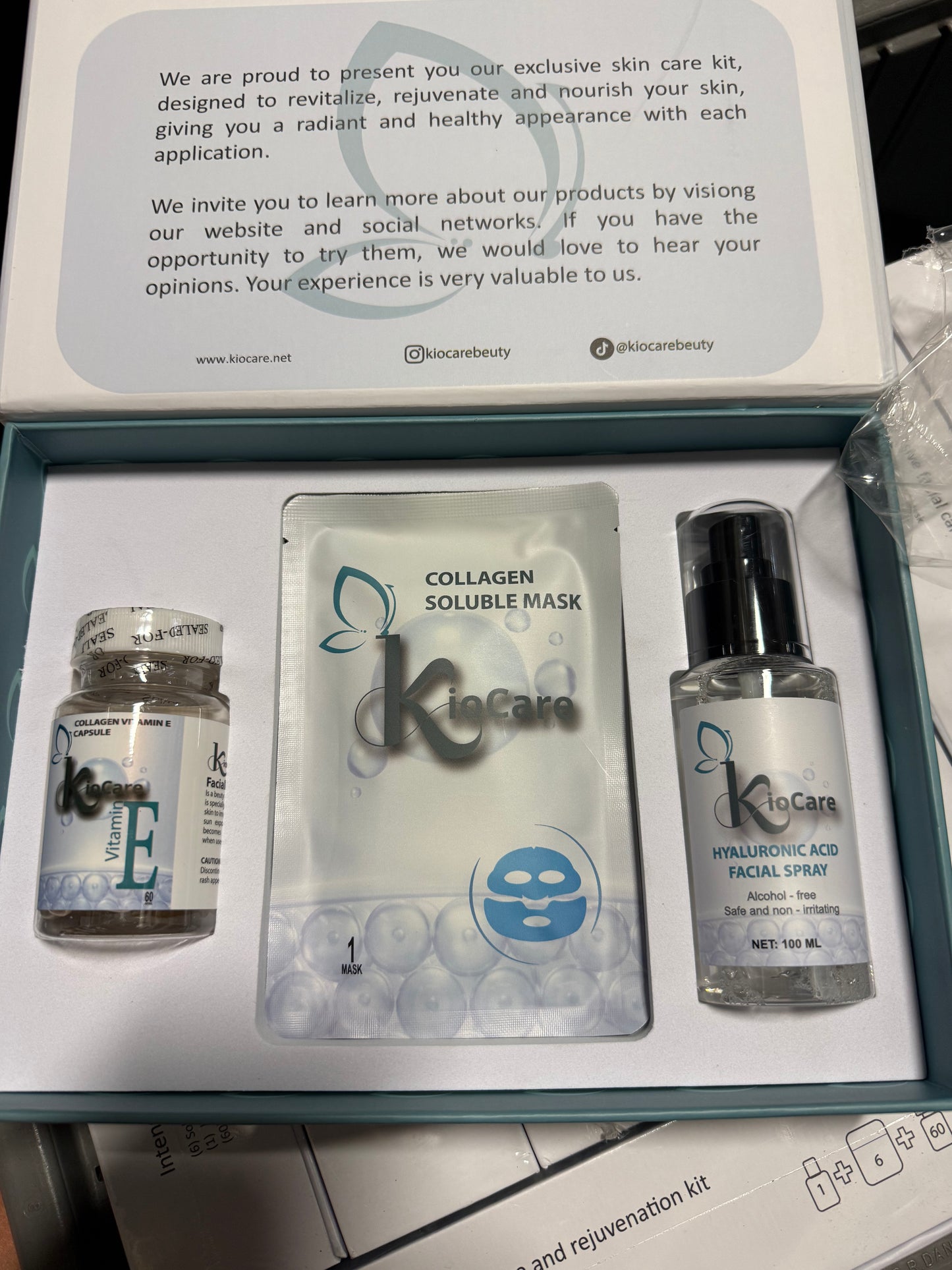 3-piece KioCare skincare gift set containing: * Collagen + Vitamin E capsules (60 count) * Collagen soluble sheet mask * Hyaluronic Acid facial spray (100 mL)